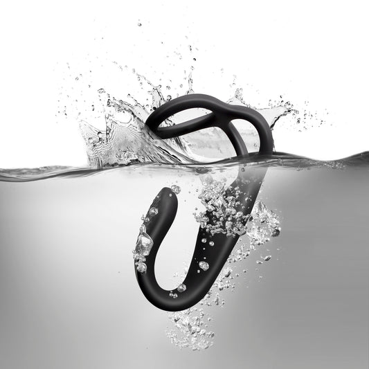Rocks Off TheVibe anal stimulator with male strap-on, splashing into water.