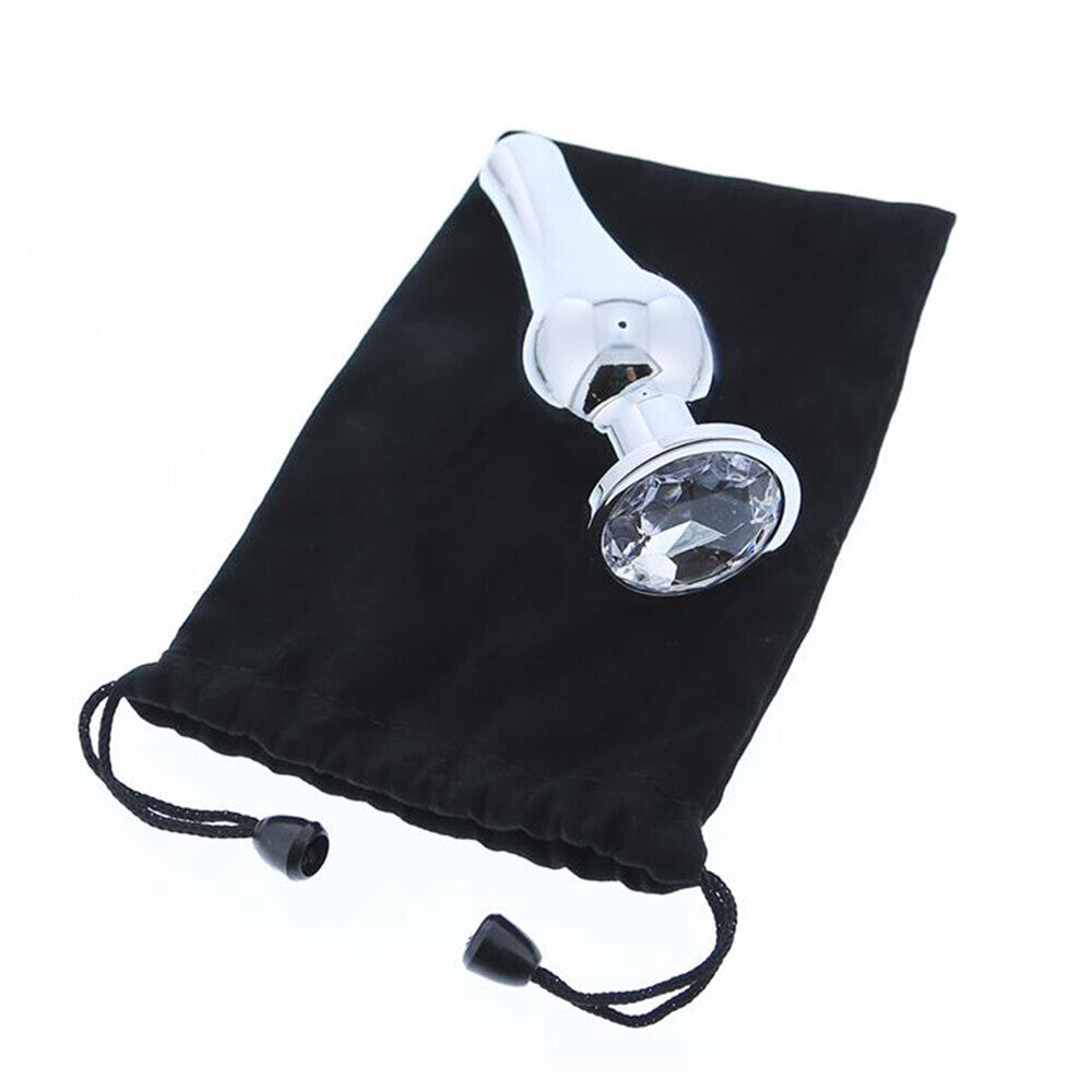 Gleaming anal plug with jeweled base and drawstring pouch
