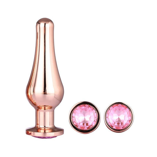 Rose gold butt plug with pink jewelled plugs.