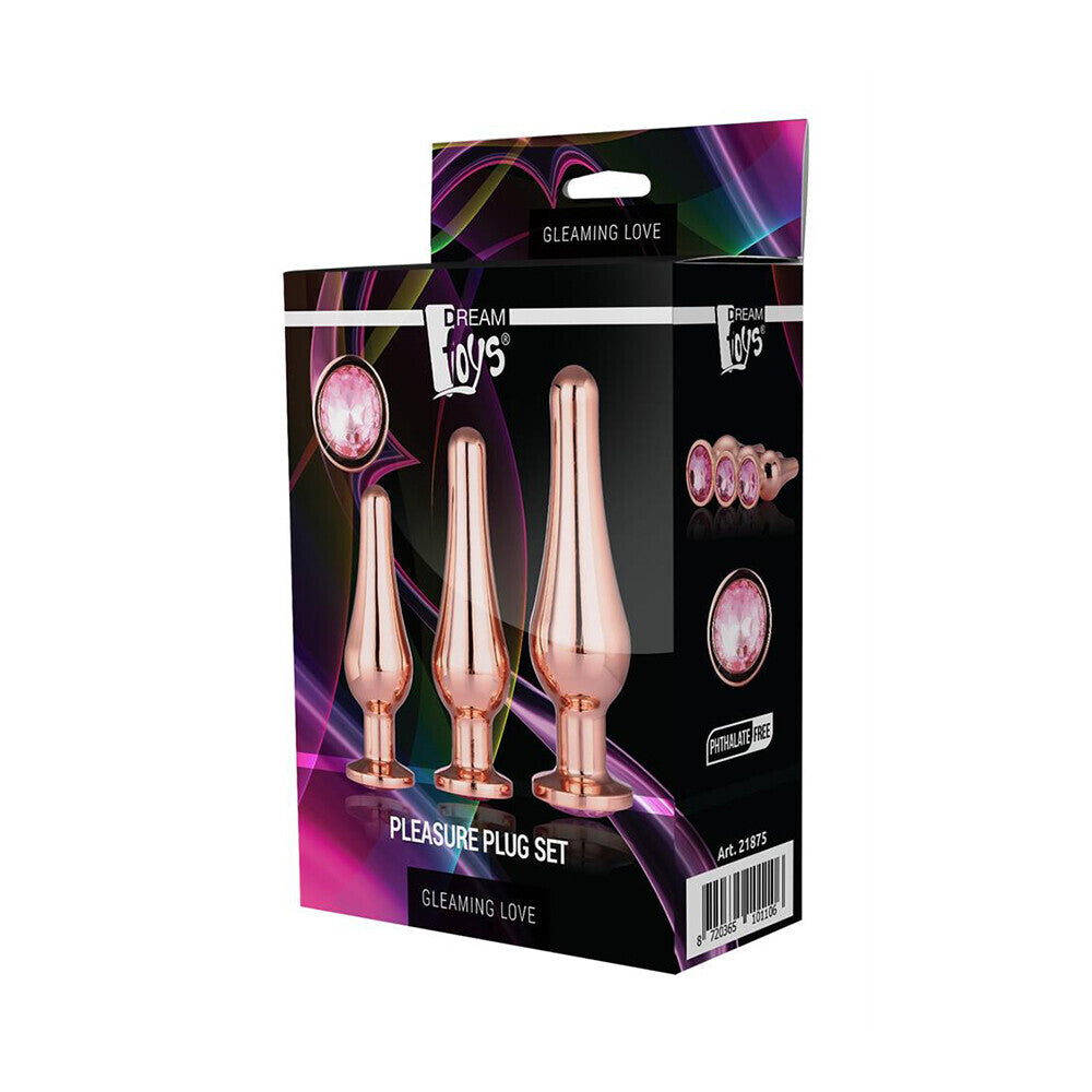 Rose gold pleasure plug set in box, phthalate-free. Trio of gleaming butt plugs for confident exploration.