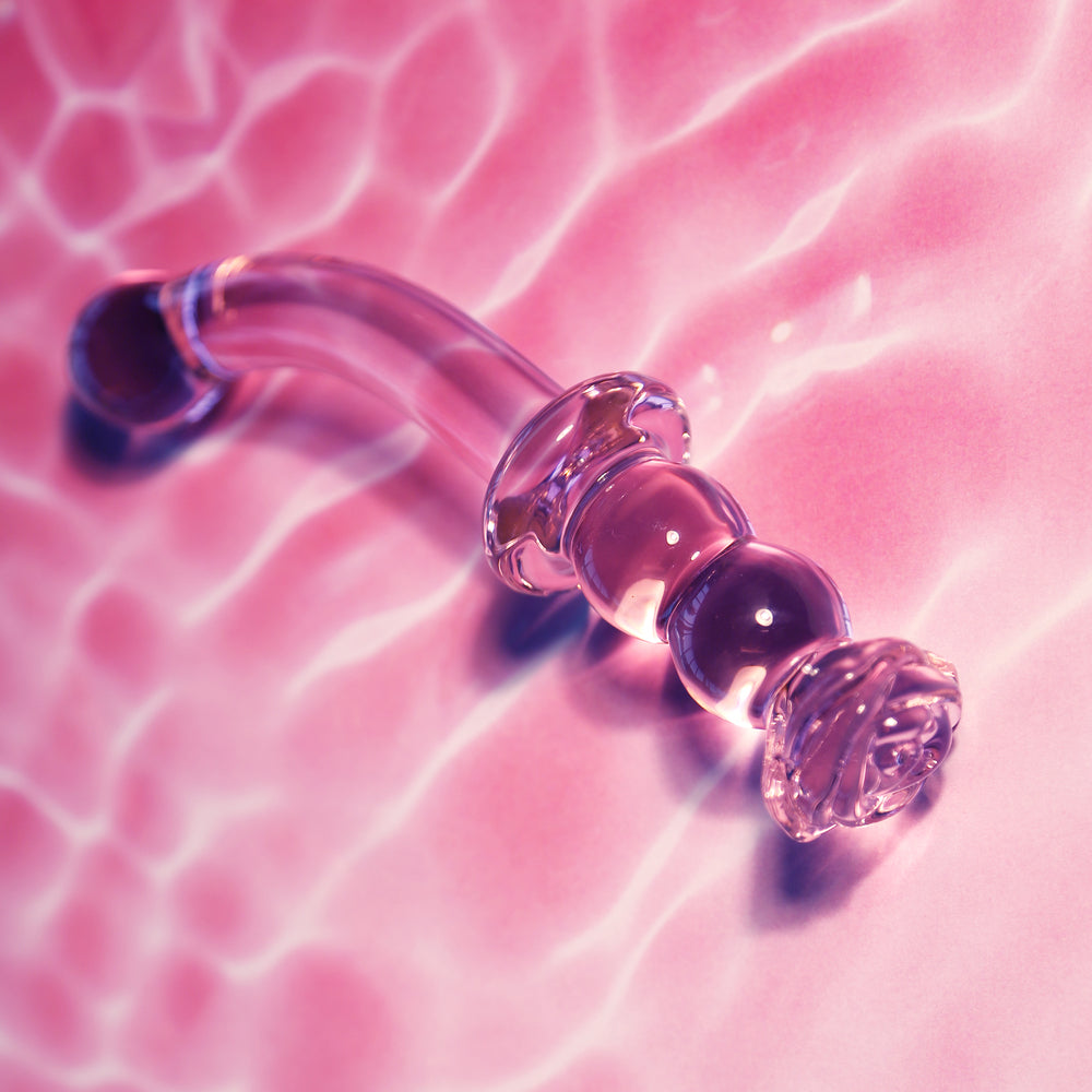 Glass rosebud G-spot dildo for adventurous pleasure.