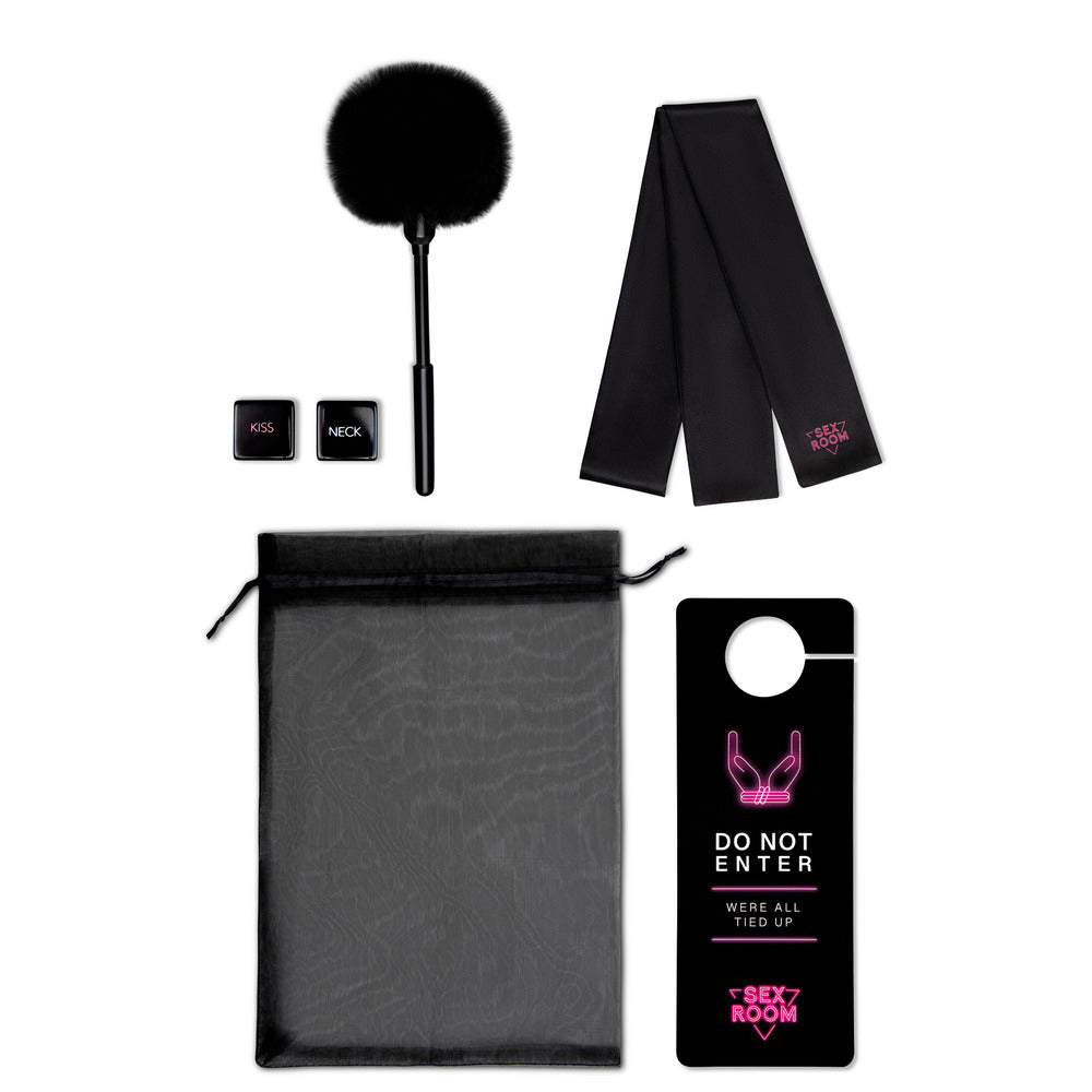 Bedroom fun kit with silky restraints, feather tickler and sassy door hanger.