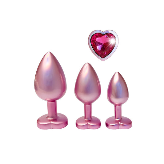 Gleaming pink butt plug set with heart-shaped gem, Dream Toys.