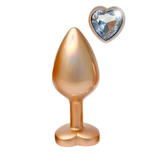 Gleaming gold-pearl butt plug with heart-shaped crystal jewel