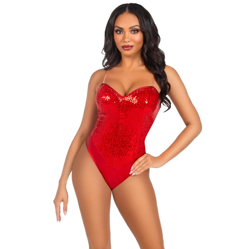 Confident woman in a red sequin bodysuit.