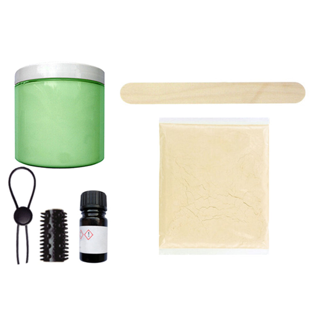 DIY dildo casting kit components: powder, liquid, tool, stick.
