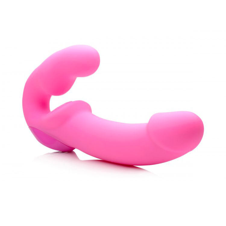 Pink vibrating strapless strap on toy