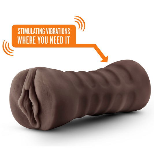 Textured hot chocolate stroker with vibrating feature.