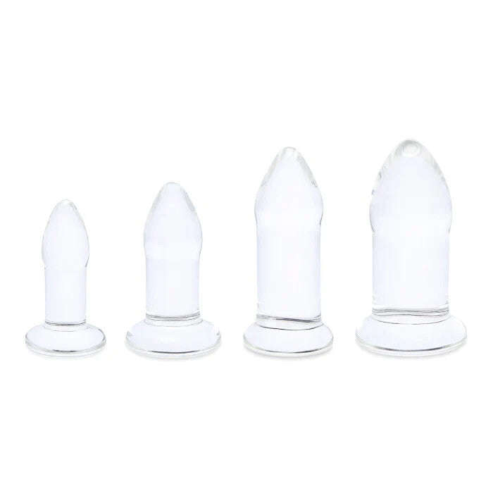 Four clear glass dilators, graduated in size, promise sensual exploration and gentle expansion.