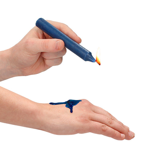 Blue wax play candle dripping onto a hand.