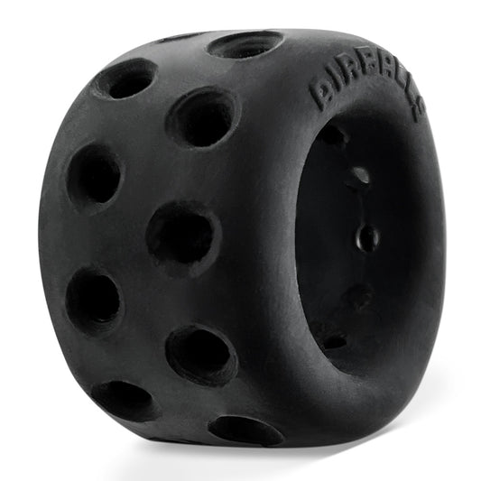 Black, porous Oxballs AirLite ball stretcher for comfortable, breathable cock and ball enhancement.
