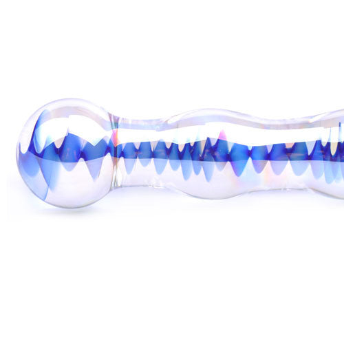 Clear, cool, and playful. This wavy glass dildo invites you to dive into a sea of pleasure.