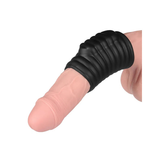 Black vibrating penis sleeve for enhanced pleasure.
