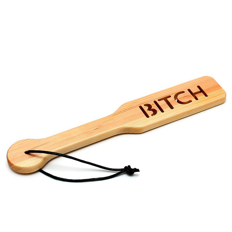 Wooden Bitch Paddle for playful erotic spanking.