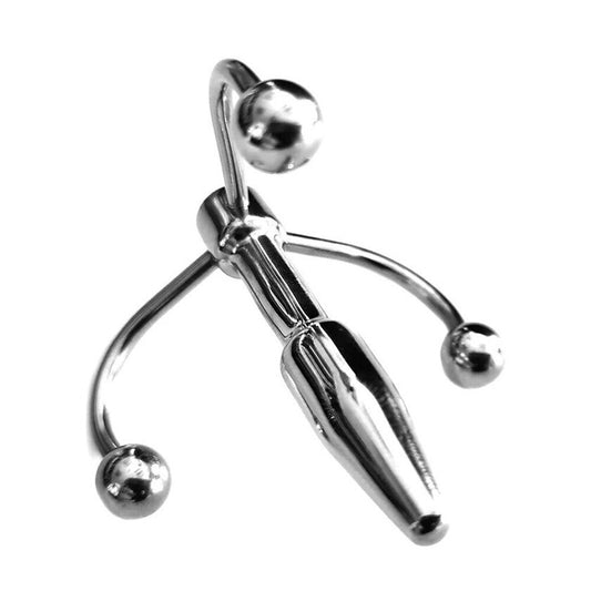 Chrome Rouge Garments crown penis plug with balls for daring pleasure.