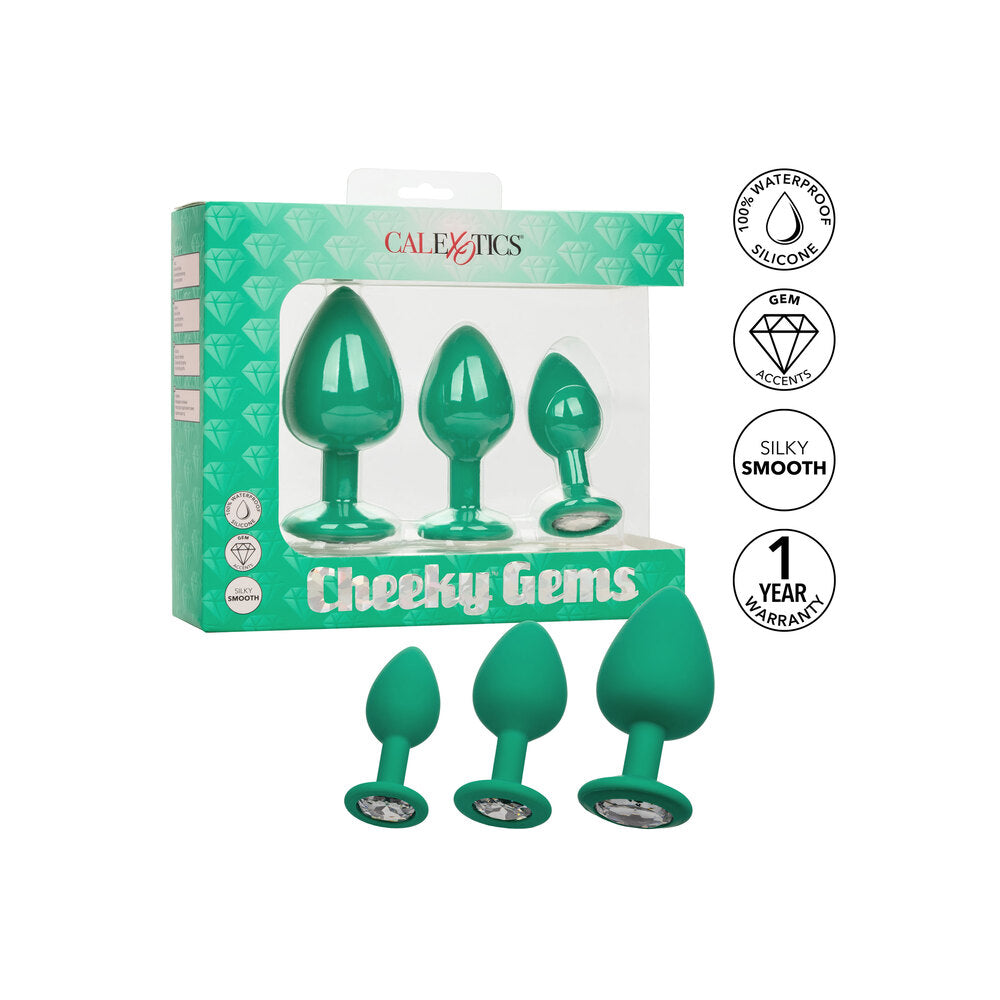 Emerald delight! A three-piece set of glitzy, green silicone butt plugs for pleasurable exploration. Gem accents add sparkle to your play.