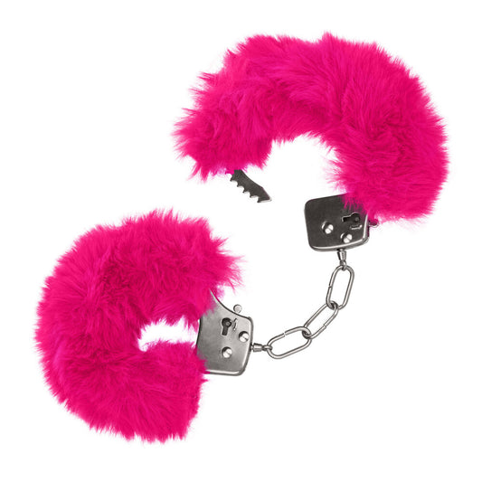 Pink fluffy handcuffs for grown-up games.