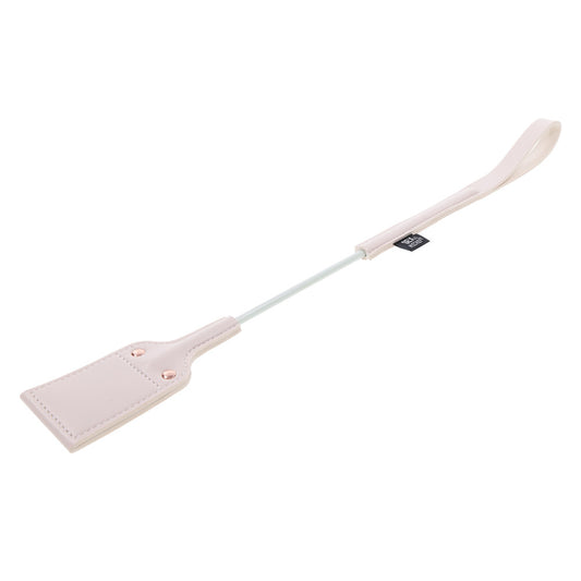 Light pink faux leather paddle.