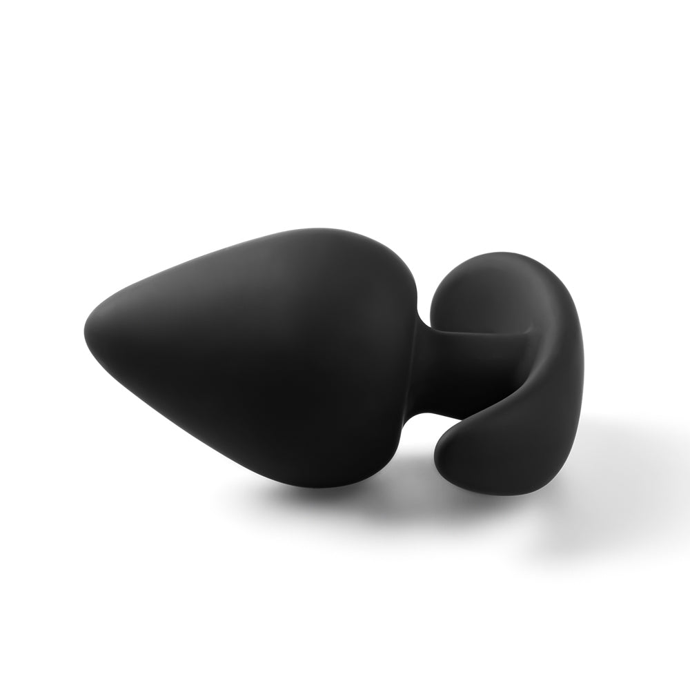 A tantalising ebony treasure, promising a delightful dash of daring. A little black secret waiting to be revealed.