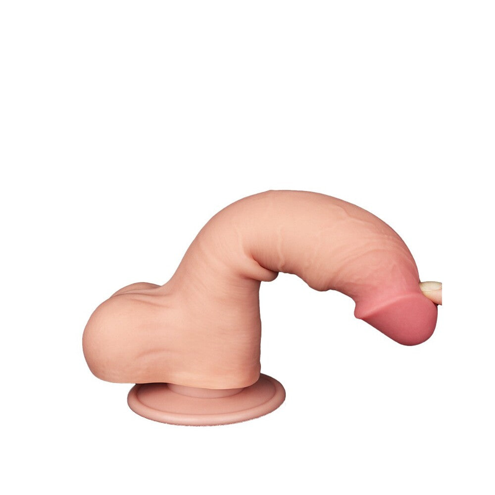 Bendable Lovetoy dildo with suction base.