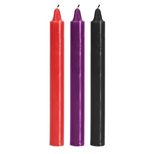 ToyJoy drip play candles in red, purple, and black.