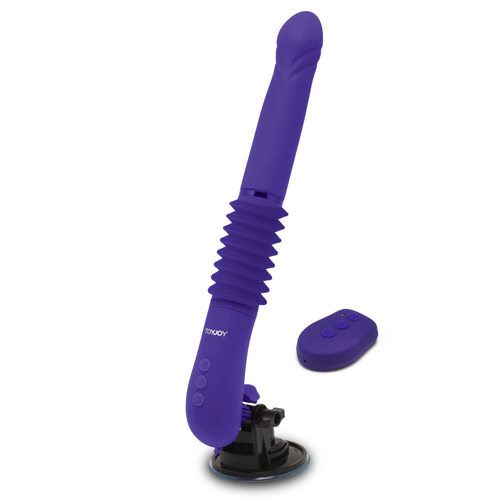 ToyJoy's Magnum Opus Thruster 2 vibrator: a purple dildo with flexible ribs and remote, for hands-free pleasure.