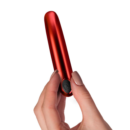 Rocks Off Ruby Caress vibrator held in hand.