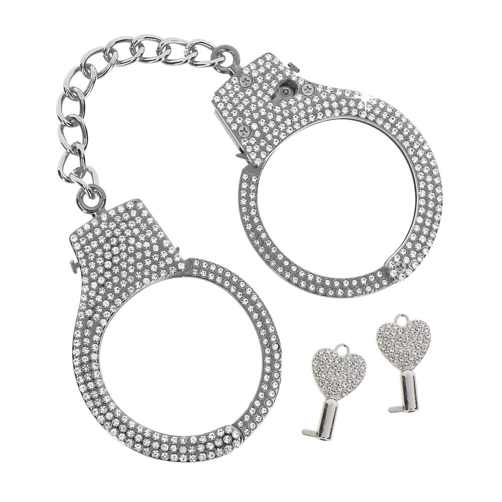 Diamond wrist cuffs with heart keys