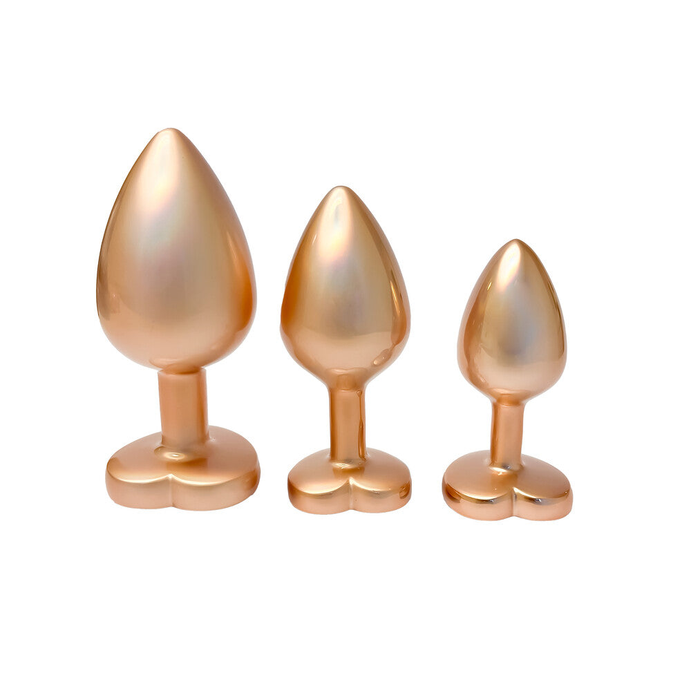 Gleaming pearl gold butt plug set for anal play