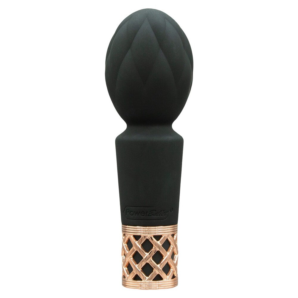 Black mini massager with rose gold lattice detail.
