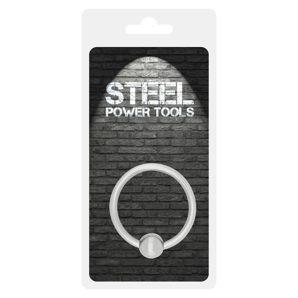 Steel Power Tools acorn ring on a brick background.