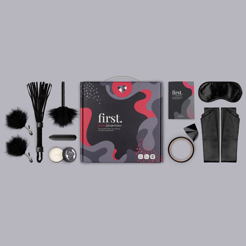 Kinky starter set with toys, restraints, flogger, and blindfold.