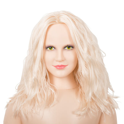 Hot Lucy personal trainer love doll from NMC Ltd. Blonde hair, green eyes.
