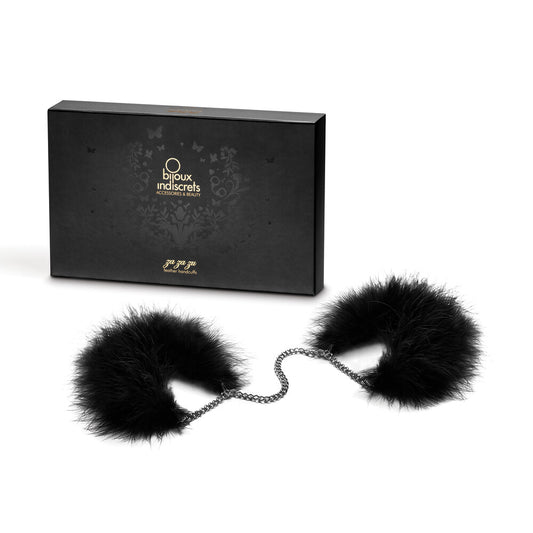 Black feathered Bijoux Indiscrets Za Za Zu handcuffs; restraint with a playful, sensual edge.