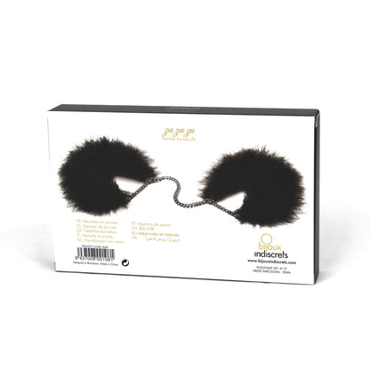 Za Za Zu: Feather handcuffs box, black fluffy restraints for playful bondage.  A naughty whisper of feathers.