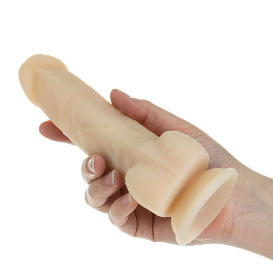 Naked Addiction rotating, vibrating dong held in hand.