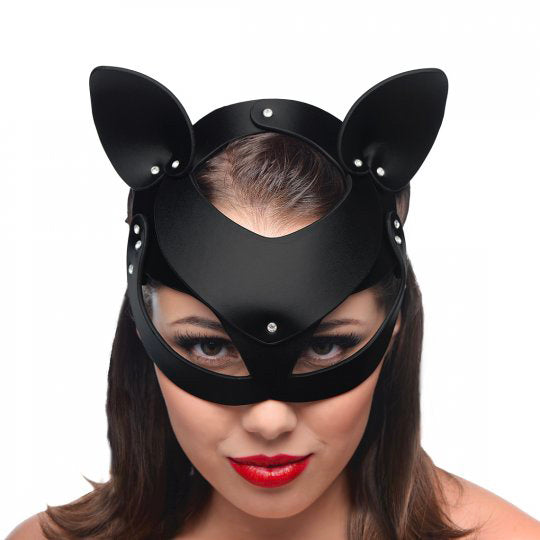 Black leather cat mask on woman