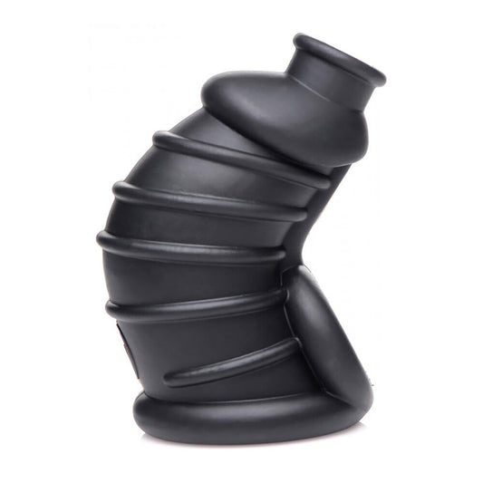 Black silicone chastity cage.