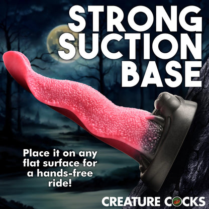 XR Brands Wolf's Lick Maw dildo. Pink textured tongue with a strong suction base. Naughty but nice creature cock fun.