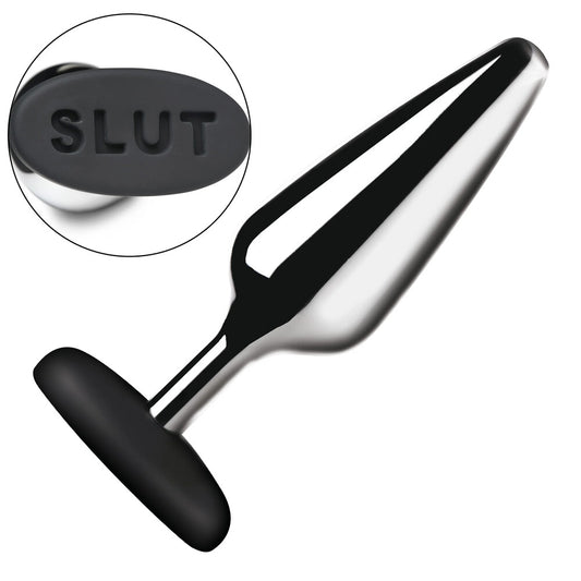 Shiny metal butt plug with "SLUT" on the base.