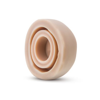 Beige penis pump sleeve.