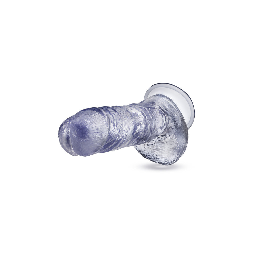 Clear, textured dildo with suction cup base, promising a thrilling adventure.