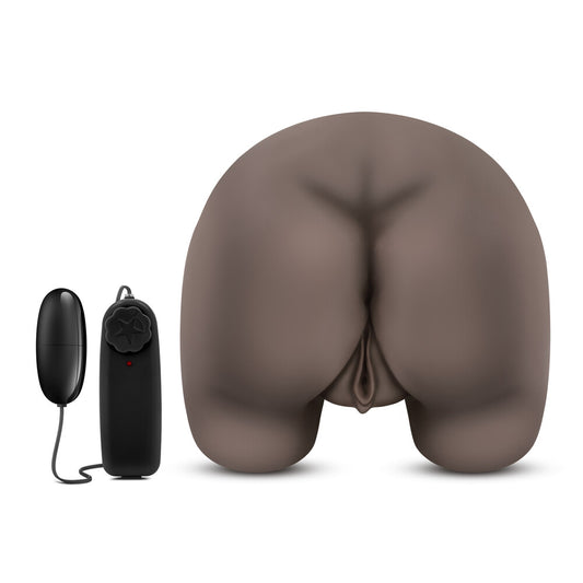 Pleasure pussy and bum toy with vibrator controller.