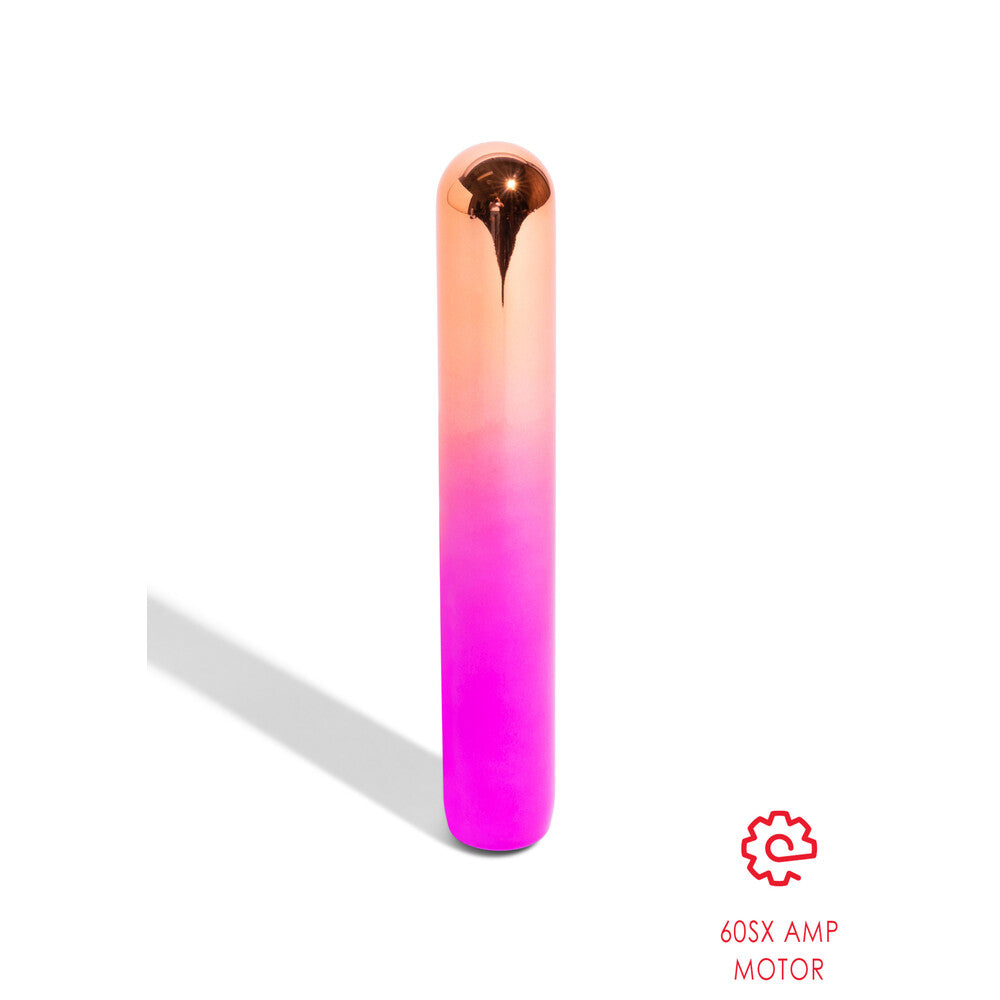 Rumba Warming Vibe: A rose gold to hot pink aluminium wand massager.
