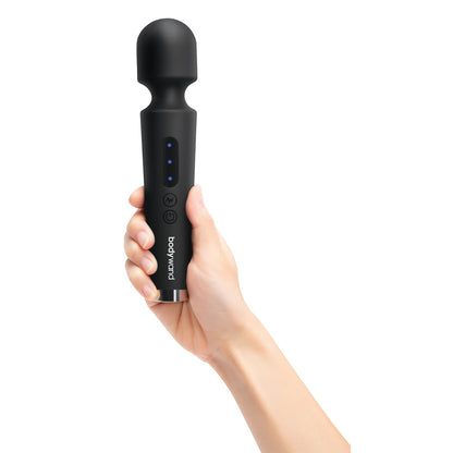 Bodywand Power Wand in black held playfully in hand.