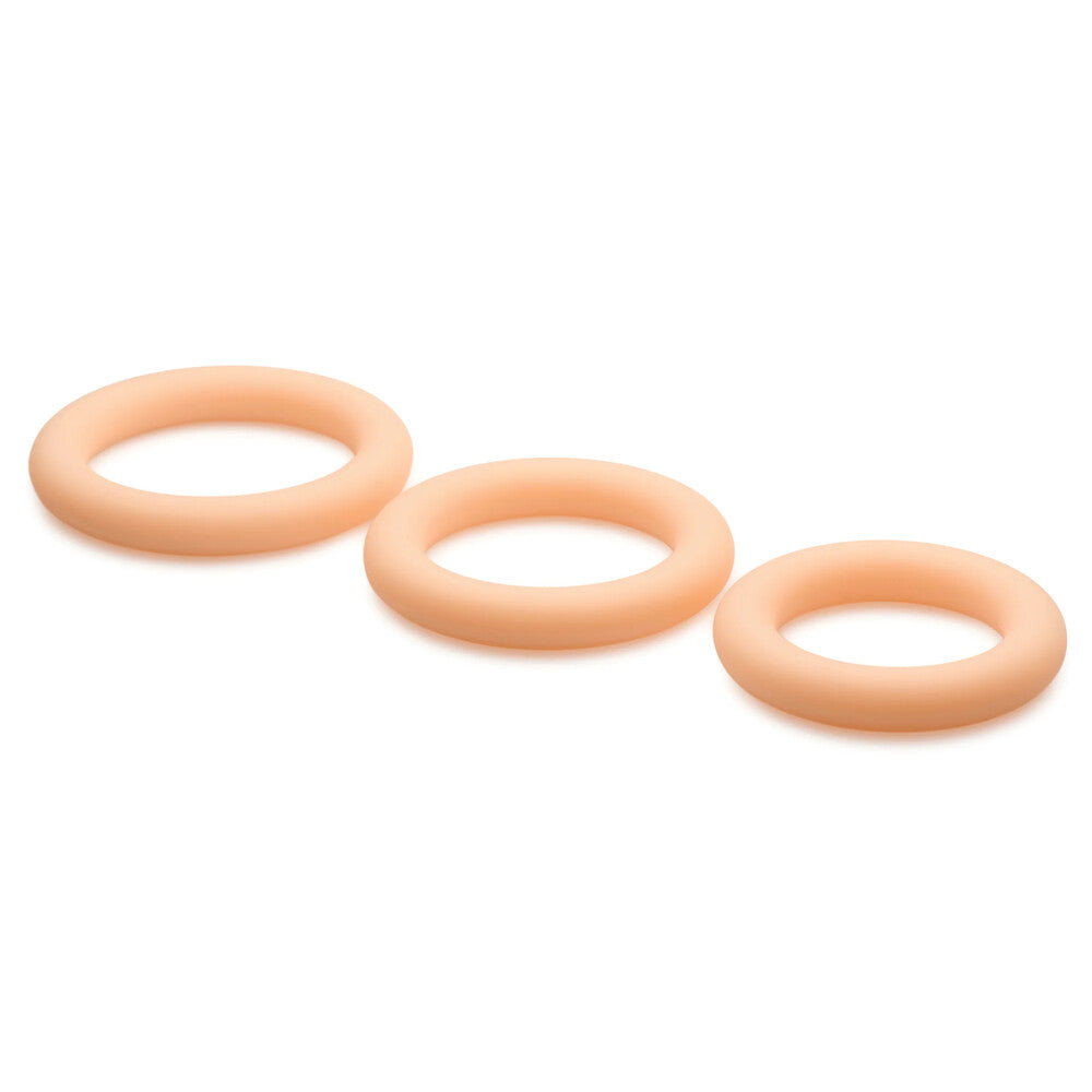 Three silicone cock rings in varying sizes.