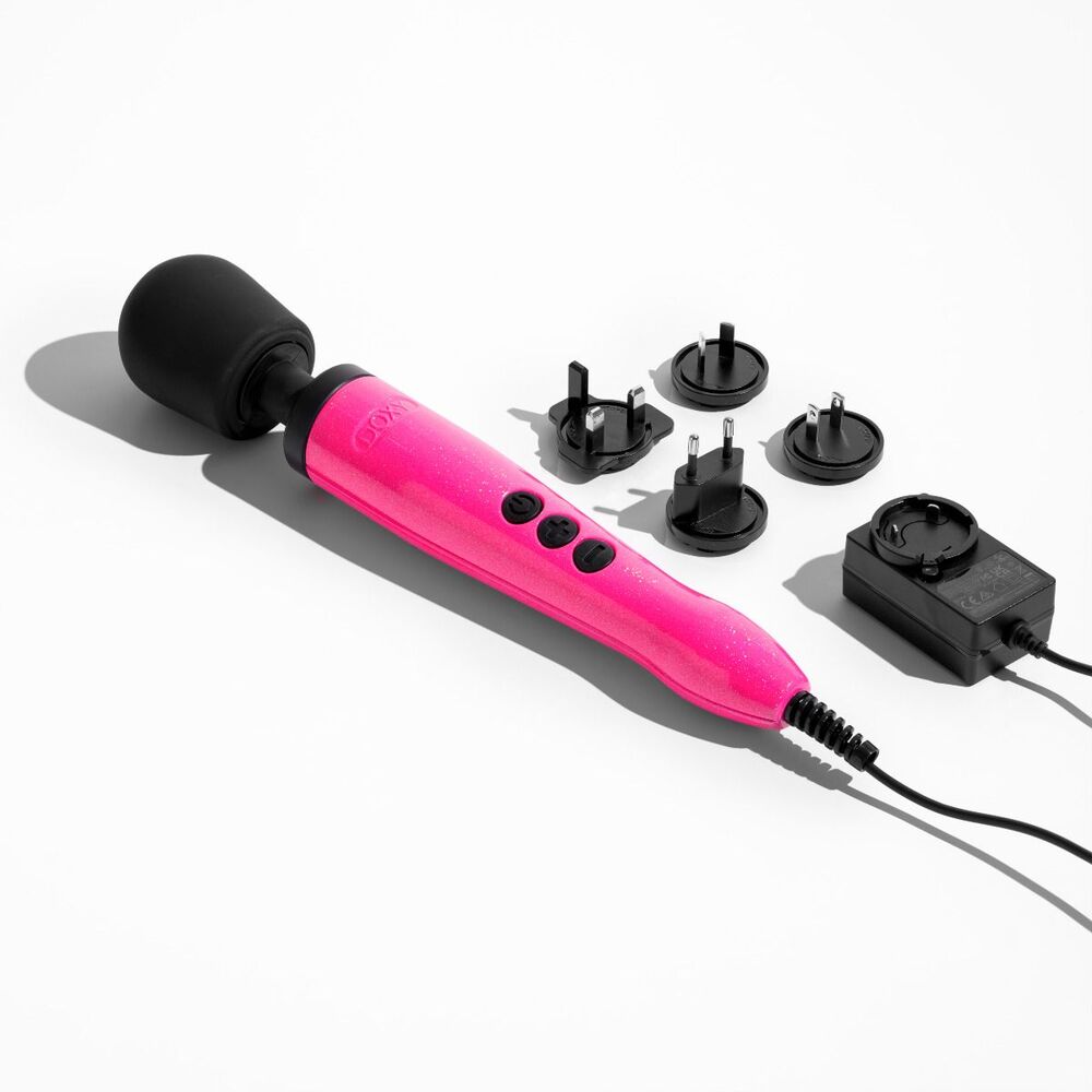 Doxy Die Cast Wand Massager in hot pink, with UK plug adaptors.