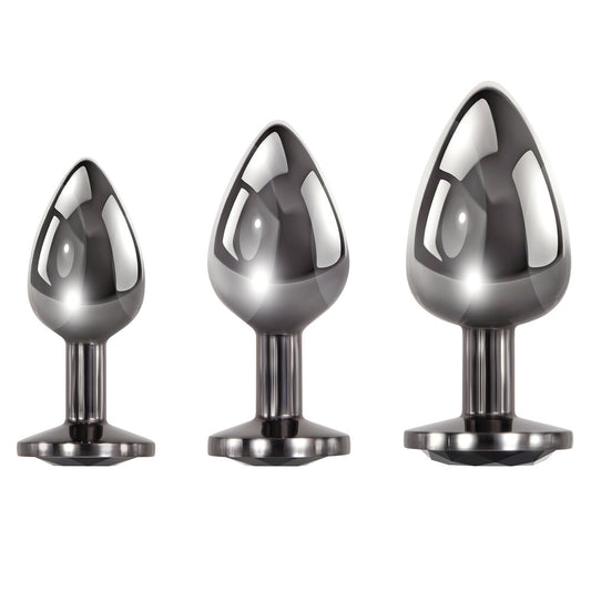 Shiny metal anal plug set, sizes small to large.
