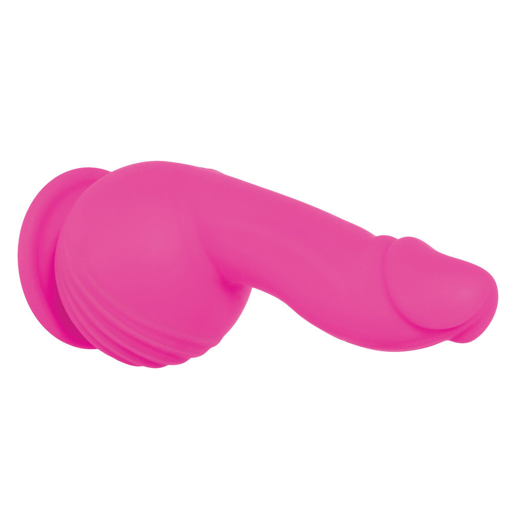 Pink ballistic dildo from Evolved, a pleasure enhancer for solo or partnered play.