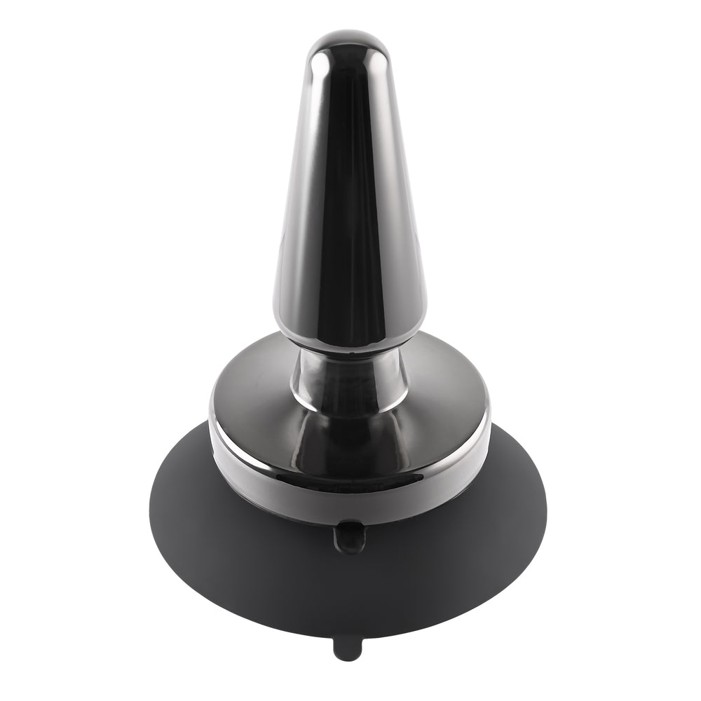 Shiny chrome metal anal plug with a black base.